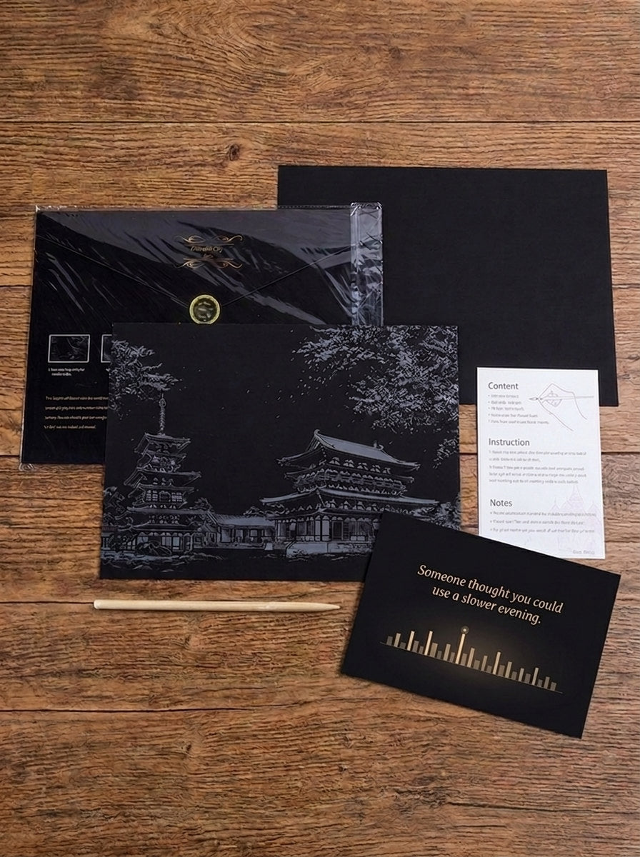What arrives: the city card printed in gray, a blank black card, the envelope, a bamboo stick, the instructions and a thank-you card